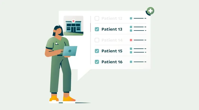 Staff member on a laptop looking at patient information